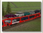 DDm Wagen verkehrsrot beladen mit PKW
