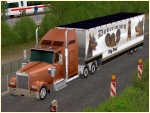 Kenworth-Truck bronze mit Trailer Dobermann
