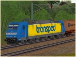 E-Lok 185 518 der TXL mit Werbeaufschrift transped in Epoche VI