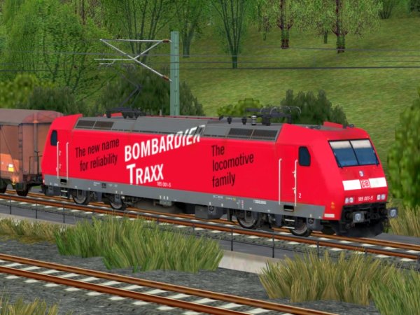 BR 185 001 der DBAG mit Werbeanschrift TRAXX Epoche V (SK2826 )