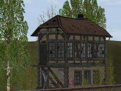 Verfallenes Stellwerk im schmutziggrauem Verputz (V60NPW10446 )
